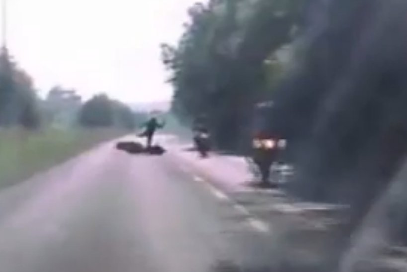 VIDEO: Breathtaking Footage Shows Moment Motorcyclist Was Inches From Death