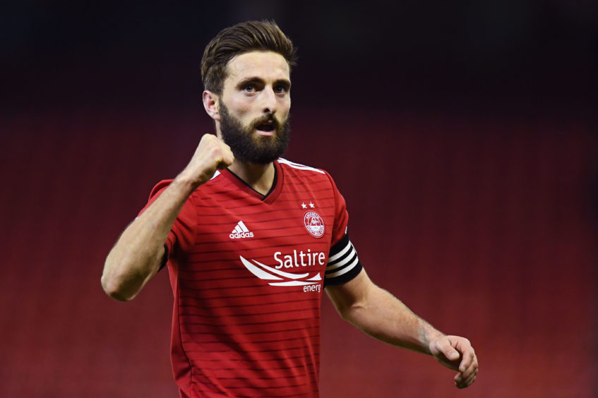 Suspended Graeme Shinnie still hoping to play a small part in an Aberdeen cup semi-final win