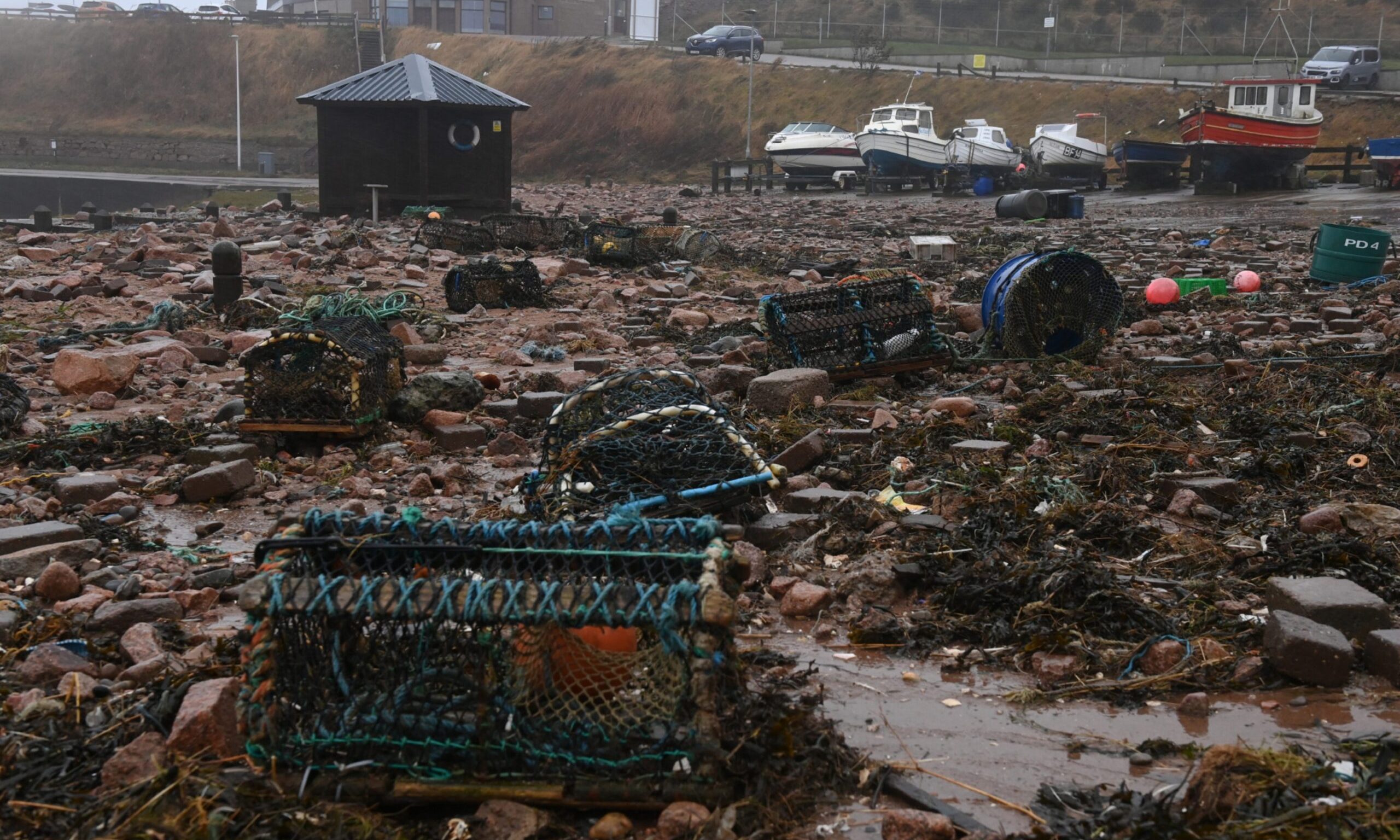 Residents Clean-up Boddam Harbour After Storm Babet Damage