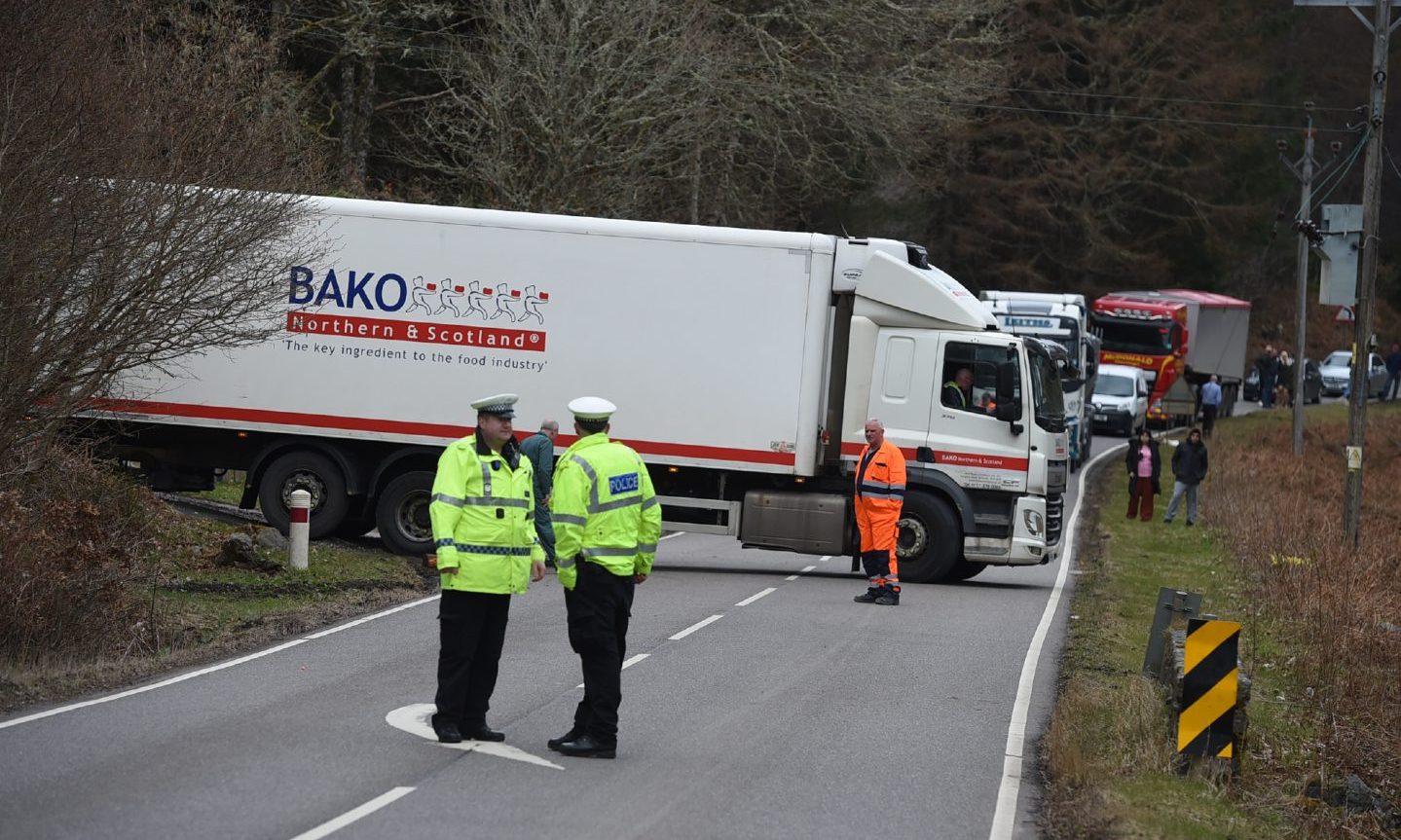 A82 closed in two places due to two car crash and stuck lorry