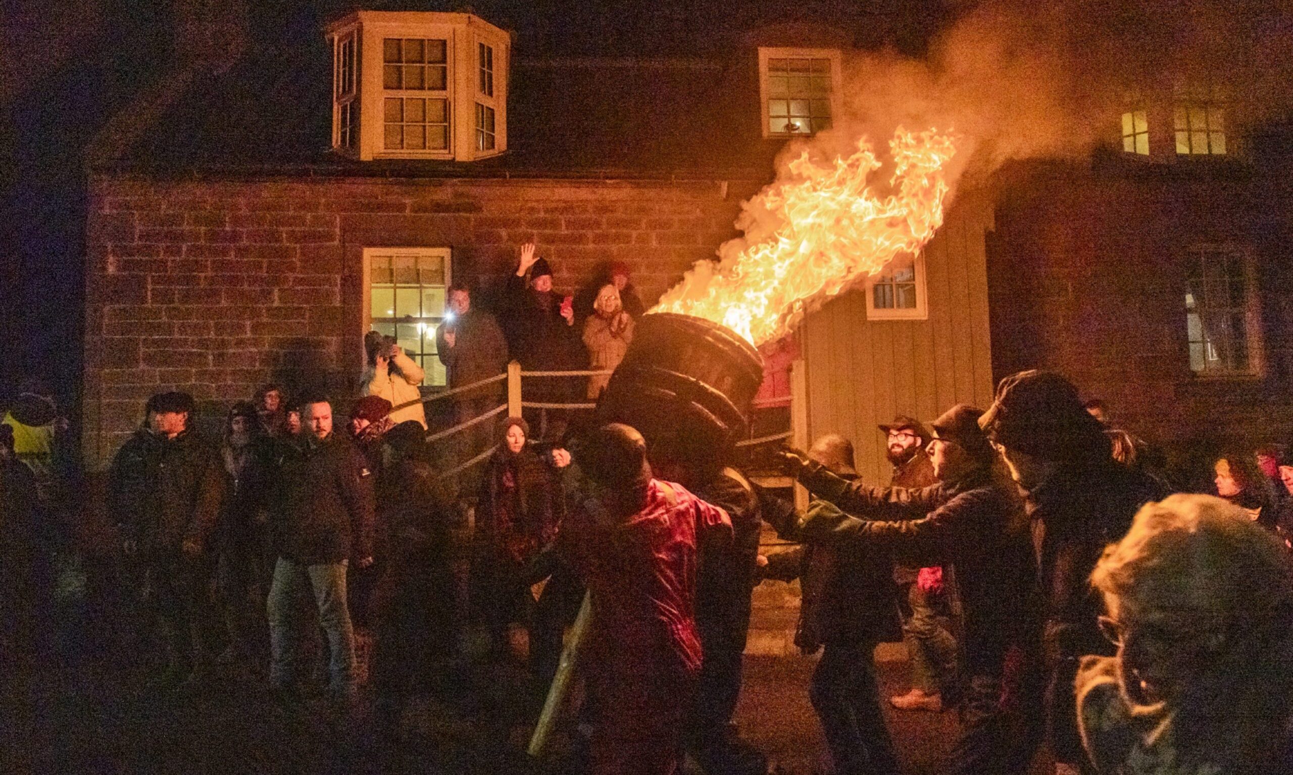 Crowds gather to watch the Burning of the Clavie 2025